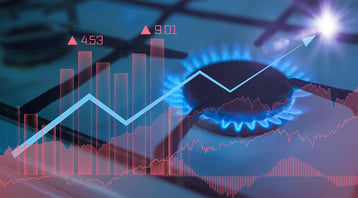 Chart of natural gas prices with a gas burner in the background